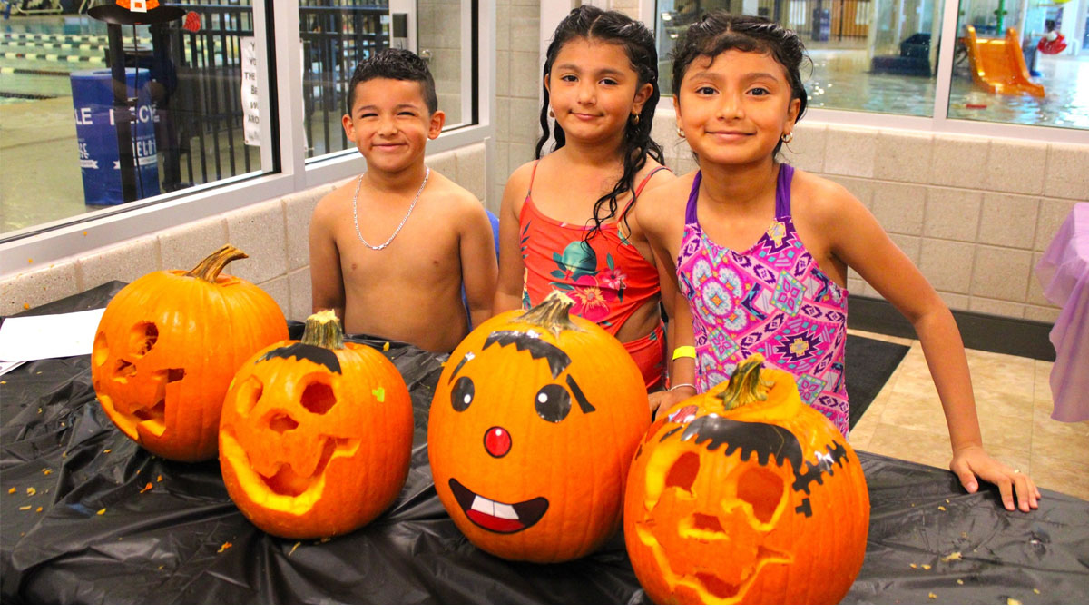 Poolside Pumpkin Patch Family Swim Night in Waukegan